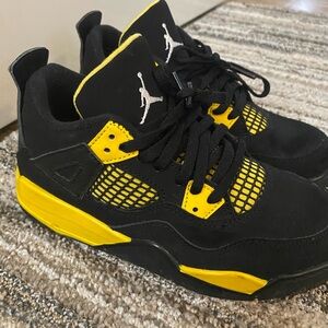 Jordan 4 Black and Yellow